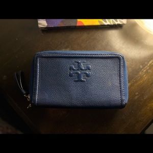 Tory Burch with storage cover.